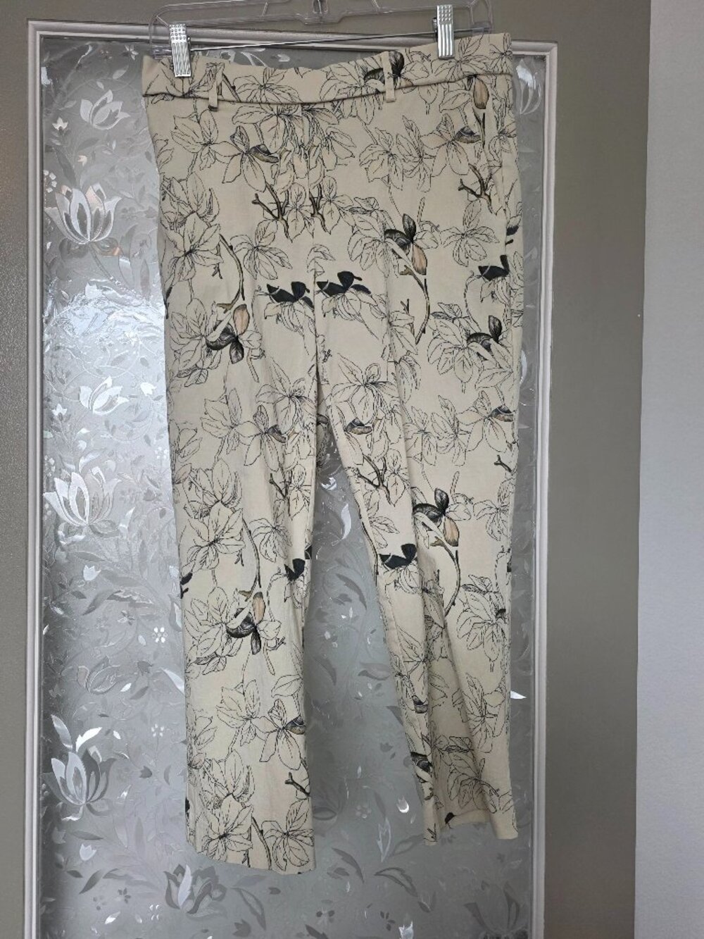 White & grey floral print women's pants - size M